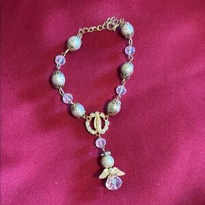 Elegant Gold and Pink Angel Pendant Bracelet